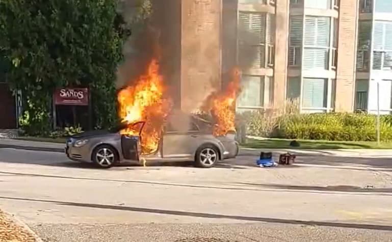 Car fire on busy Burlington street